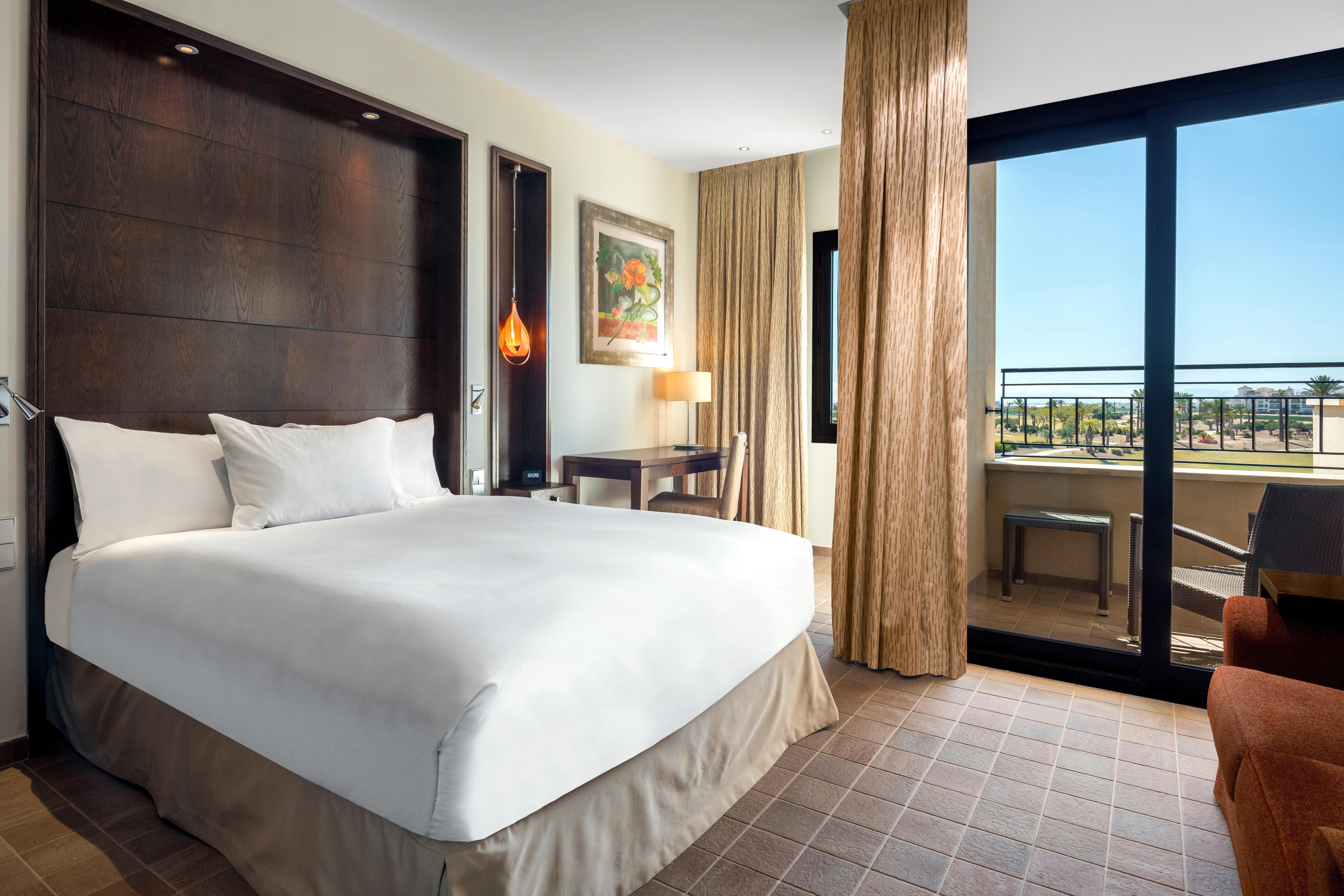 Doubletree By Hilton La Torre Golf Resort Roldan Exterior photo A bedroom at the Hilton San Diego Bayfront