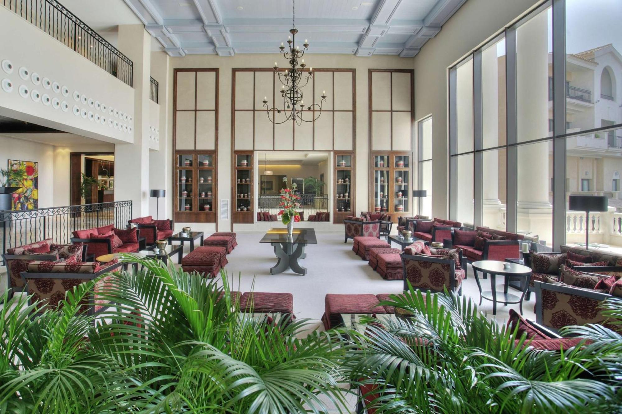 Doubletree By Hilton La Torre Golf Resort Roldan Exterior photo The lobby of the hotel