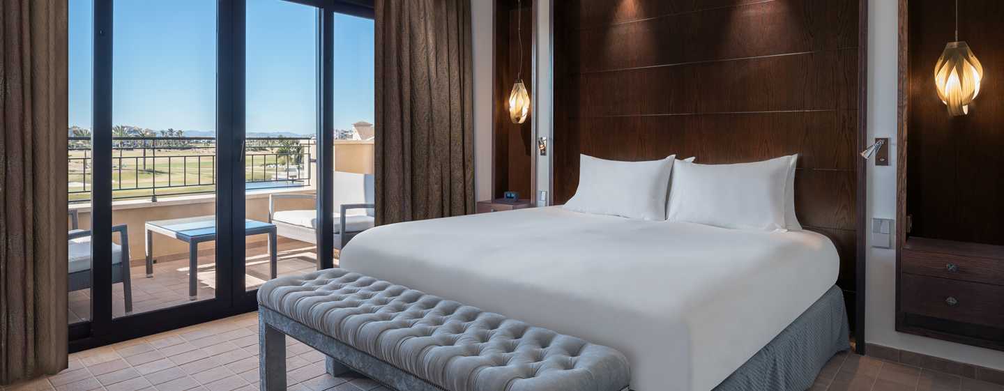 Doubletree By Hilton La Torre Golf Resort Roldan Exterior photo A bedroom at the hotel