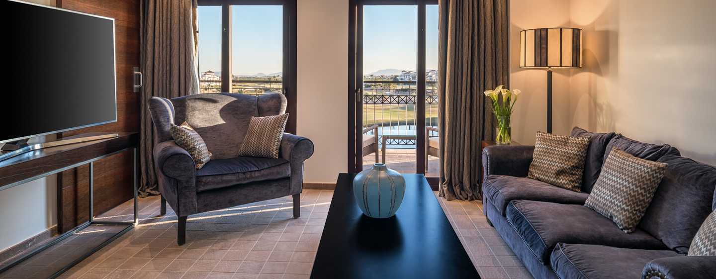 Doubletree By Hilton La Torre Golf Resort Roldan Exterior photo A suite at the hotel